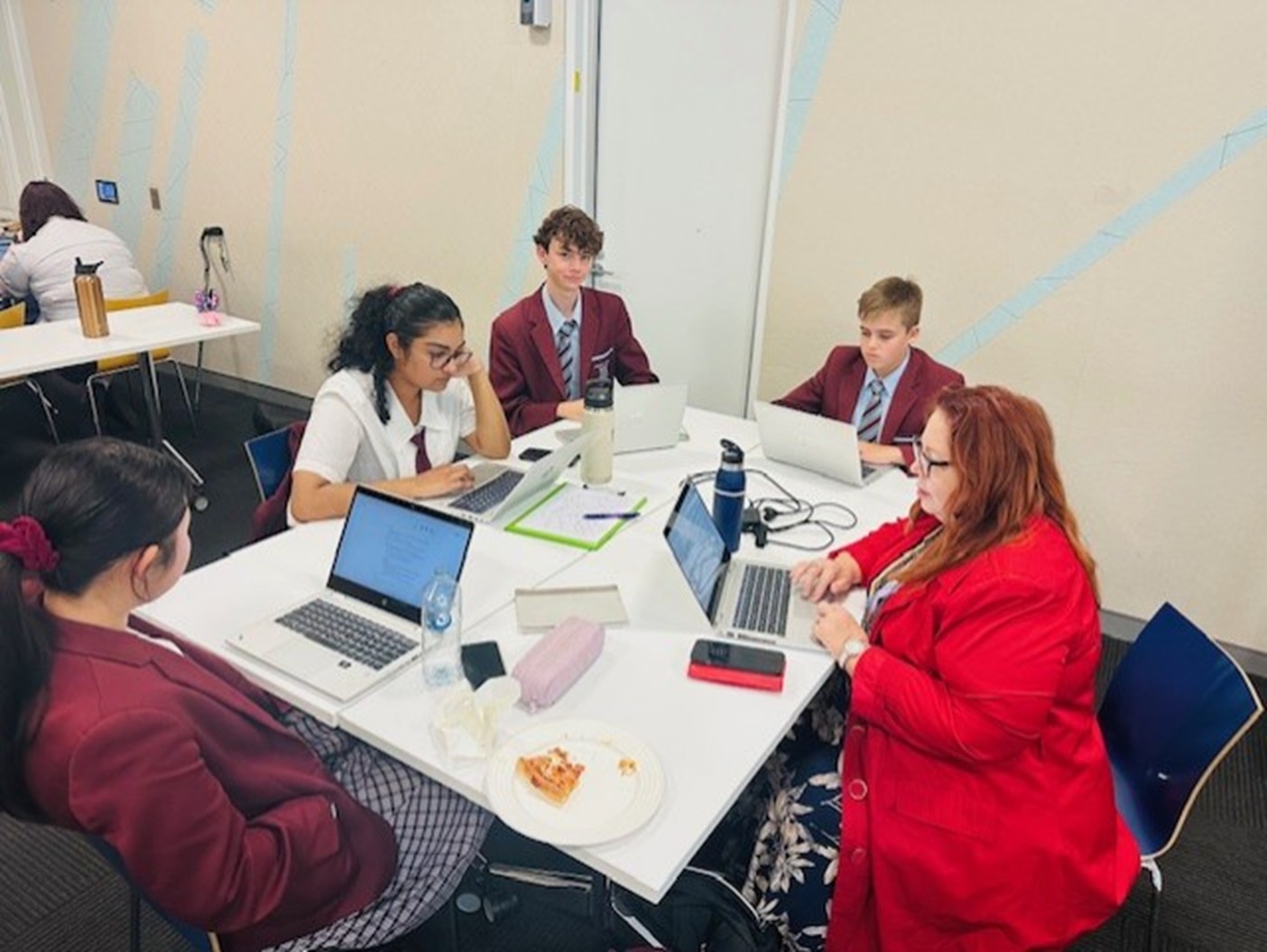 Students from Ormiston College and their geography educator Roslyn Minnikin participating in the SDG GIS workshop.