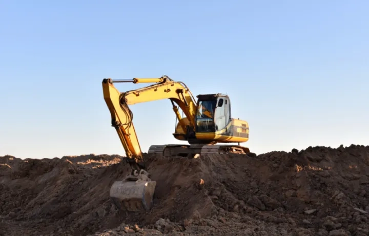 An excavator digging on a construction site
