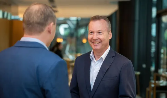 Peter speaking with customer